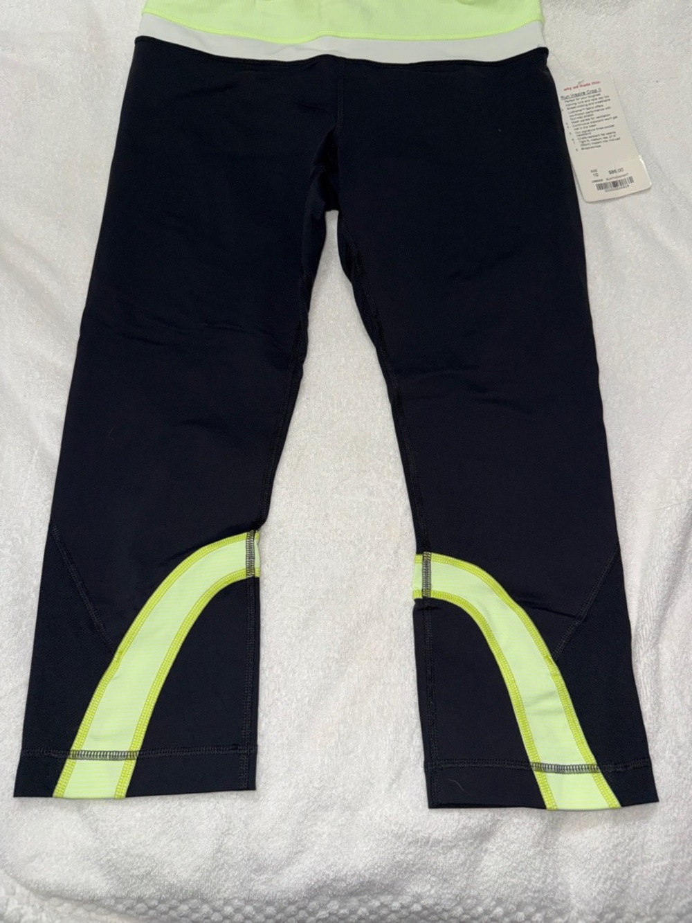 lululemon athletica Black Capri Leggings with Neon Yellow Accents